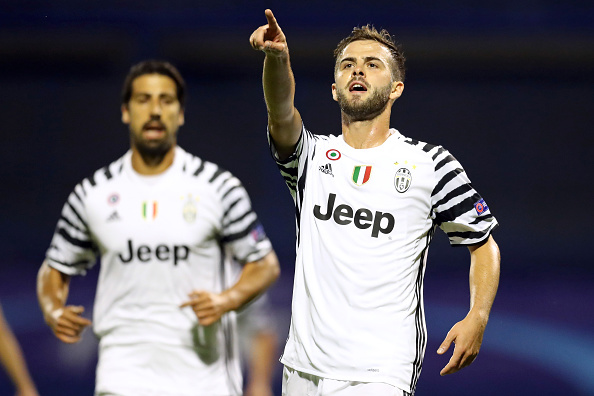 Juventus' Bosnian midfielder Miralem Pjanic celebrates after scoring a goal during the UEFA Champions League group H football match between Dinamo Zagreb and Juventus Turin at the Maksimir Stadium in Zagreb on September 27, 2016. / AFP / STRINGER        (Photo credit should read STRINGER/AFP/Getty Images)